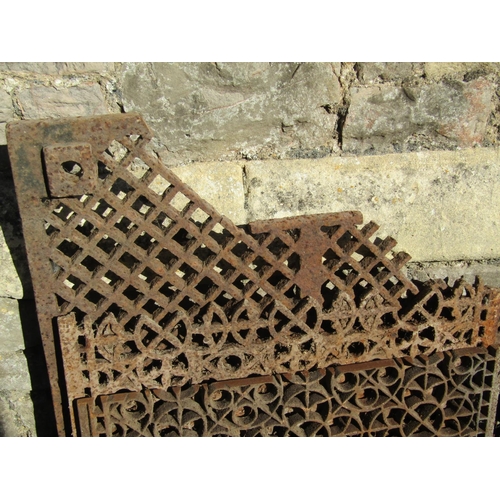 2142 - A pair of antique cast iron grills 60 cm x 78 cm, further matching example (af two pieces), etc