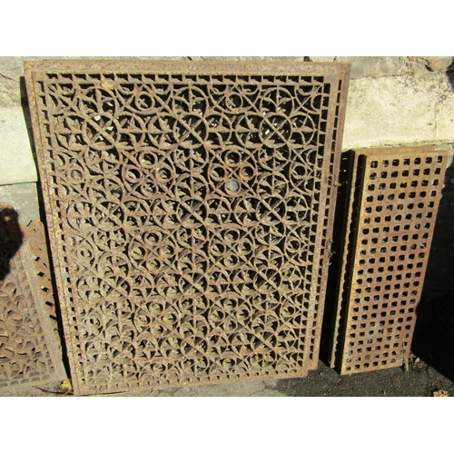 2142 - A pair of antique cast iron grills 60 cm x 78 cm, further matching example (af two pieces), etc