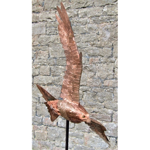 2145 - A life size sculpture/study of a red kite in flight by Bob Rowley mounted and set within a stone bas... 