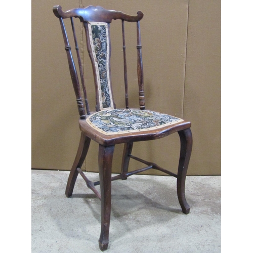 2194 - A Swedish stained elm and  beechwood stick back elbow chair with circular seat, together with two ot... 