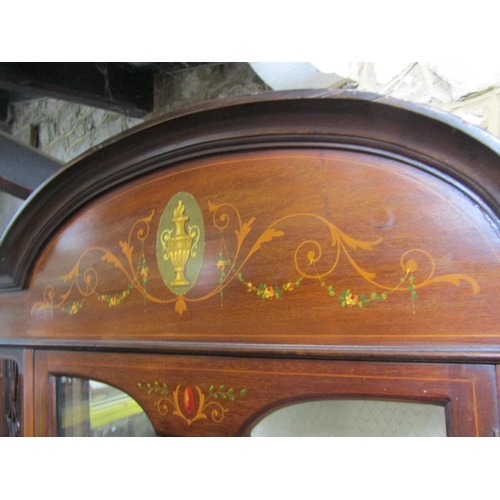 2204 - An Edwardian mahogany display cabinet, enclosed by a central partially glazed split moulded panelled... 