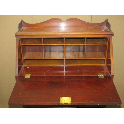 2220 - An inlaid Edwardian slim mahogany bureau bookcase combination 74 cm wide