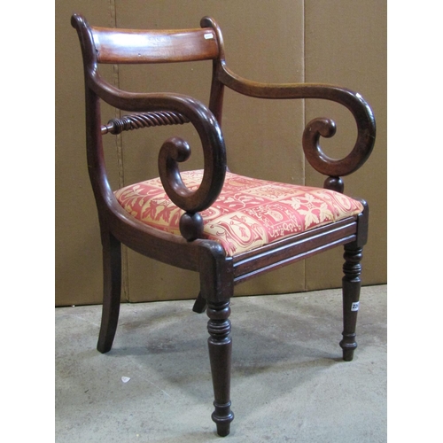 2263 - A 19th century mahogany bar back carver chair with rope twist splat