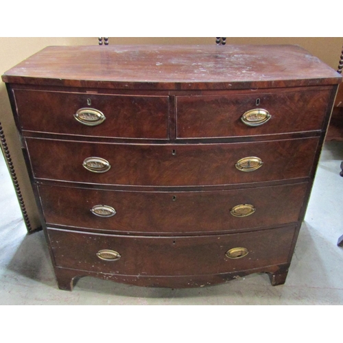 2286 - A Georgian mahogany and stained oak sided bow fronted bedroom chest of two short over three long gra... 