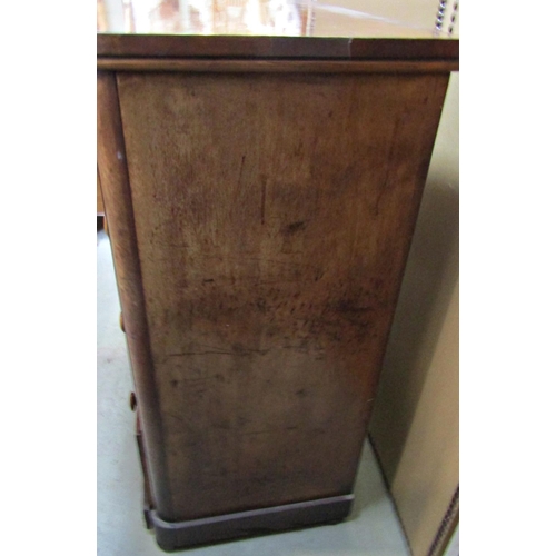 2296 - A Victorian mahogany bedroom chest of two short over three long drawers, flanked by rounded corners ... 