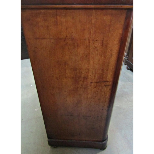 2296 - A Victorian mahogany bedroom chest of two short over three long drawers, flanked by rounded corners ... 