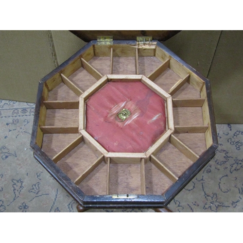 2307 - A Victorian walnut veneered trumpet shaped workbox/sewing box of octagonal form with hinged lid and ... 