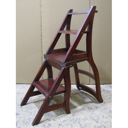 2310 - A reproduction hardwood bar back metamorphic library chair/steps