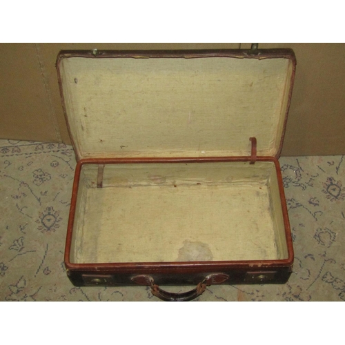 2316 - A Goldsmiths and Silversmiths Ltd leather vanity case with silk lined interior, (lacks fittings) tog... 