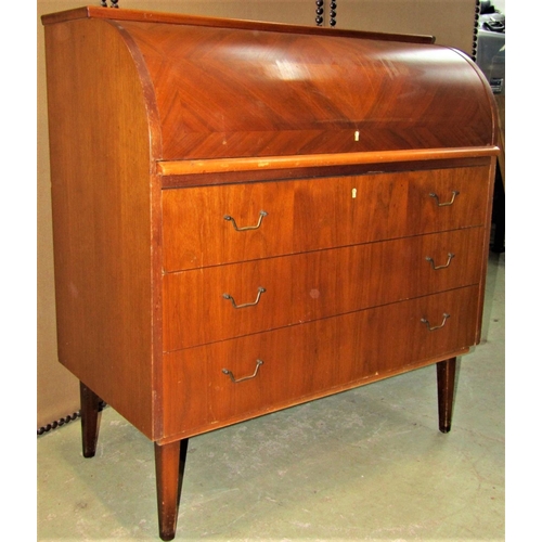 2322 - A mid 20th century walnut veneered cylinder roll top desk fitted with three long drawers raised on s... 