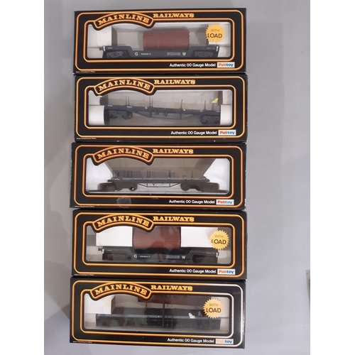 342 - 24 boxed 00 gauge models by Mainline comprising various wagons and vans including 37-172 GWR Bogie B... 