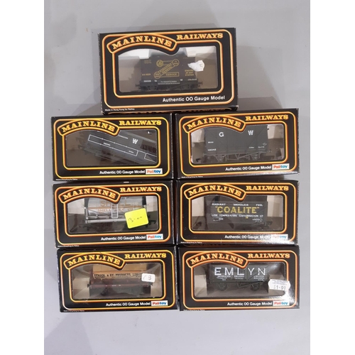 342 - 24 boxed 00 gauge models by Mainline comprising various wagons and vans including 37-172 GWR Bogie B... 