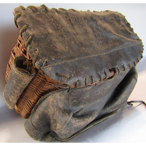 1712 - A fisherman’s wicker and leather creel basket.