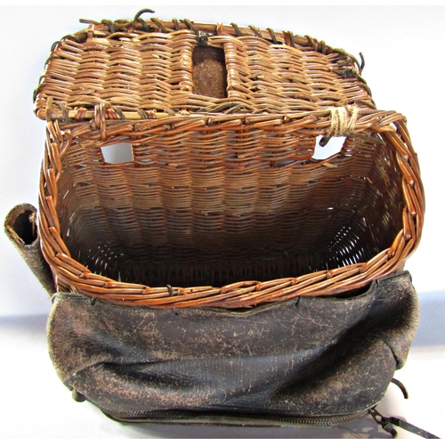 1712 - A fisherman’s wicker and leather creel basket.
