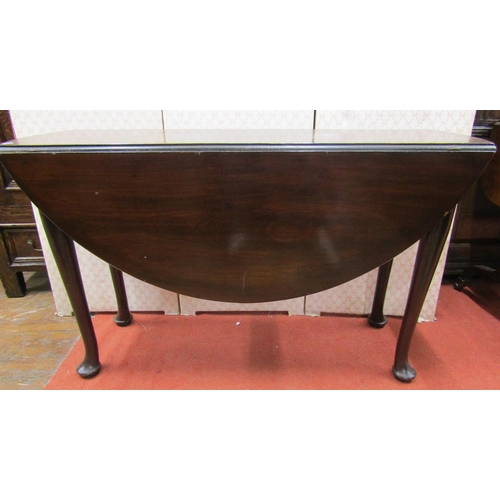 2637 - A Georgian mahogany pad-foot drop leaf dining table, 122cm long