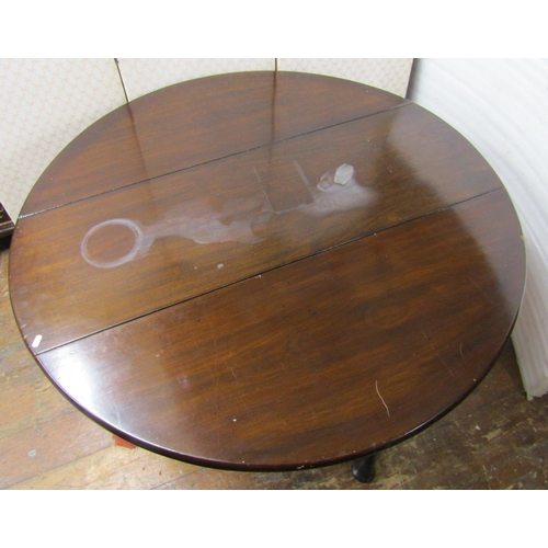 2637 - A Georgian mahogany pad-foot drop leaf dining table, 122cm long