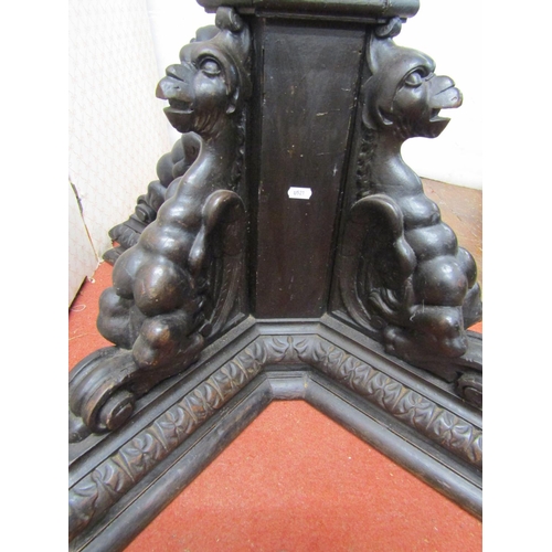 2639 - Victorian oak octagonal column pedestal, supported by four carved winged creatures, 66cm high