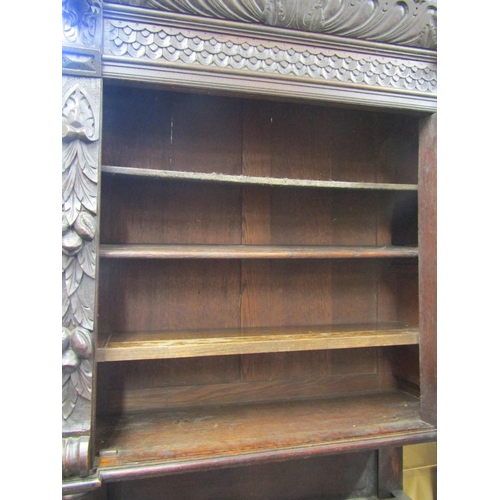 2641 - 19th century oak pier cabinet, lower section enclosed by a panelled door and drawer, upper section w... 