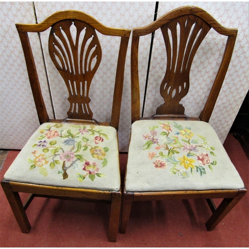 2642 - A pair of Georgian elm countrymade side chairs, with pierced splats and hand worked tapestry seats, ... 