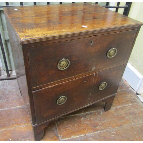 2649 - Small Georgian mahogany and pine chest of two drawers with brass ring handles, 61cm wide x 70cm high