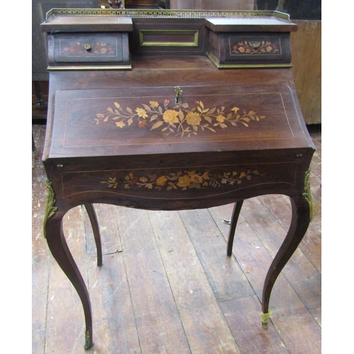 2657 - A 19th century rosewood Bonheur De Jour, the fall flap enclosing a simply fitted interior, on shaped... 