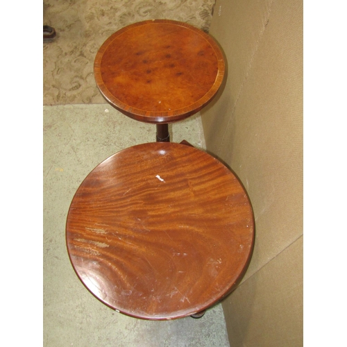 2331 - Two reproduction Victorian style mahogany pedestal occasional tables with circular tops, (varying de... 