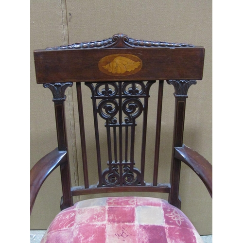 2353 - An Edwardian mahogany open elbow chair in the Georgian style, with pierced and scrolled splat and in... 