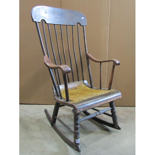 2404 - A Boston style rocking chair with slender stick back, scrolled arms and seat and original painted wi... 