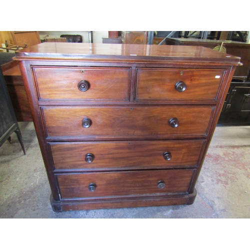 2562 - A Victorian mahogany chest of three long and two short drawers, 122cm wide x 120cm high