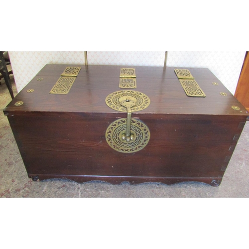 2569 - A Chinese pine coffer with brass hinges and further fittings, 104cm long x 56cm deep x 48cm high