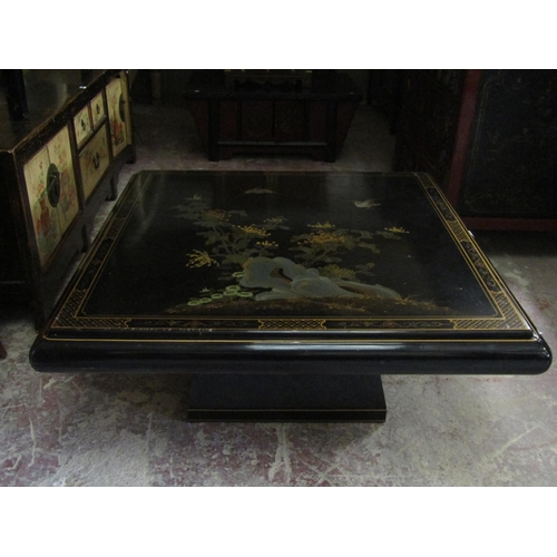 2574 - A Chinese black lacquered square cut occasional table, the top decorated with birds, chrysanthemums ... 