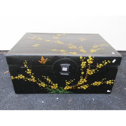 2575 - A Chinese black lacquered trunk with hand painted prunus blossom detail, 80cm long x 55cm deep x 36c... 