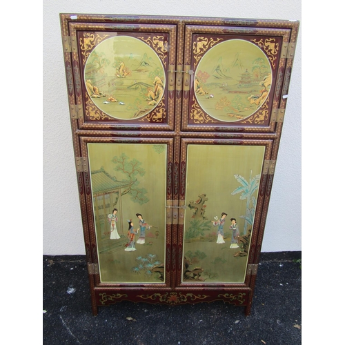 2578 - A Chinese lacquered hanging cupboard enclosed by two panelled doors, with overlay repeating gold det... 