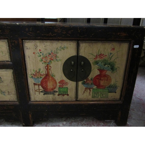 2582 - A Chinese low side cupboard enclosed by two pairs of panel doors ad three central drawers, with pain... 