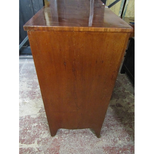 2584 - A Regency mahogany chest of three long and two short drawers with brass plate handles, 106cm wide