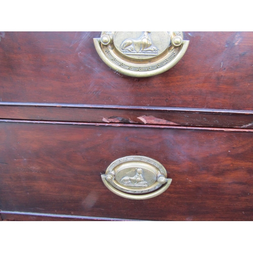 2586 - A Georgian mahogany chest of four long graduated drawers on ogee supports with original brass plate ... 