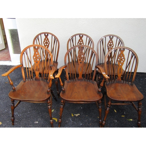 2611 - A set of six (2+4) Windsor wheelback kitchen chairs by Glanister of High Wycombe with elm seats