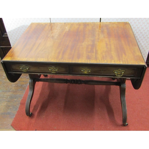 2658 - A Regency mahogany sofa table with rosewood crossbanding, with two frieze drawers and an open stretc... 