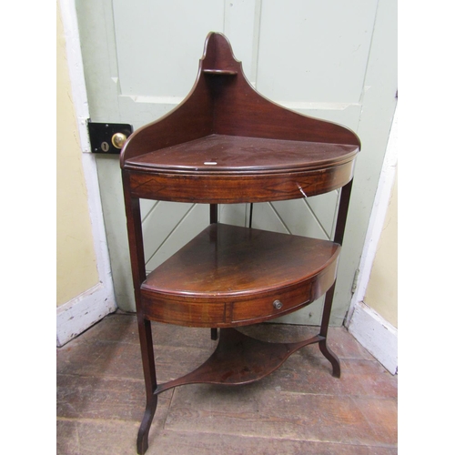 2659 - Georgian mahogany corner wash stand on swept supports