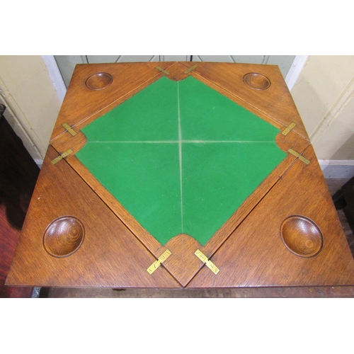 2662 - Edwardian oak envelope card table with frieze drawer, shaped supports and claw and ball feet, 55cm s... 