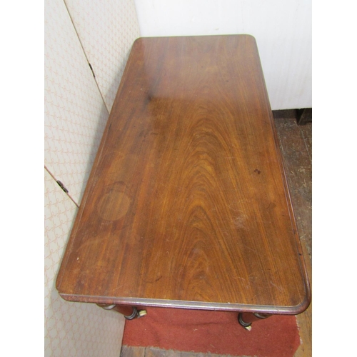 2669 - Victorian mahogany side/writing table, with two drawers on turned tapered supports, 122cm wide