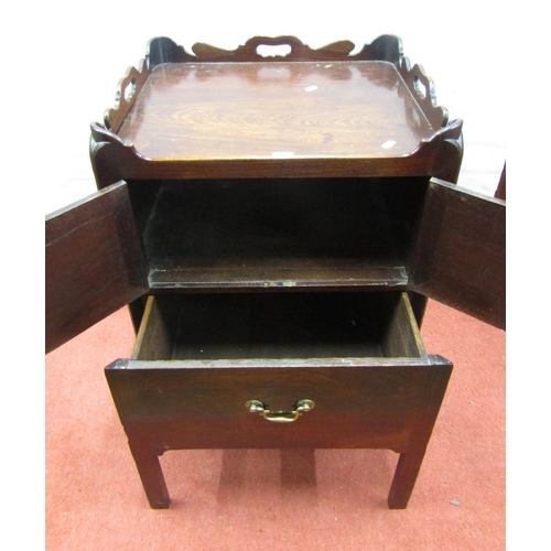 2702 - A Georgian mahogany tray top commode, with two doors and drawer, with a shaped and pierced galleried... 