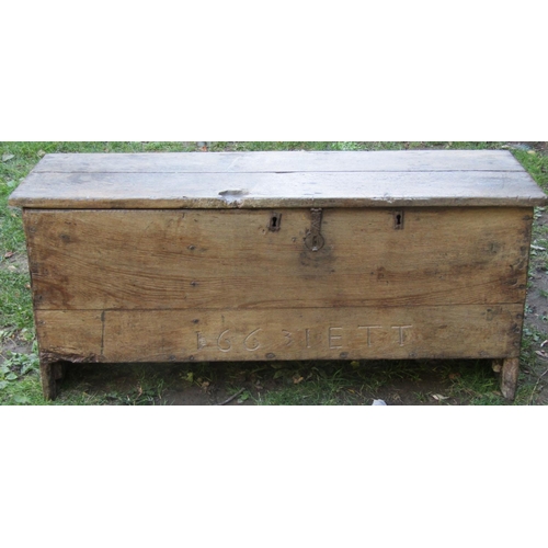 2681 - 17th century boarded coffer dated 1663, initialled I.E.T.T., formerly with two locks, with iron hasp... 