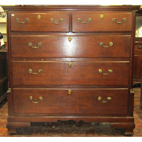 2694 - A substantial Georgian oak chest of three long and two short graduated drawers, with brass detail, 1... 