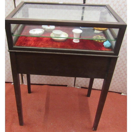 2698 - An Edwardian mahogany vitrine with glass top and sides, with two frieze drawers, set on square taper... 