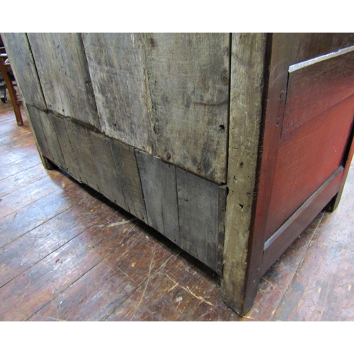 2701 - An old English oak court cupboard, enclosed by three panelled doors, the recessed upper section with... 