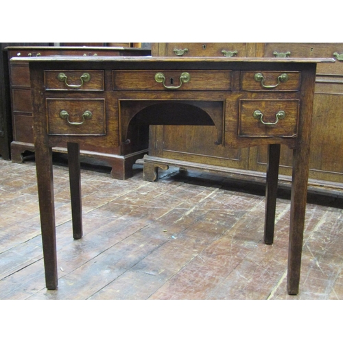 2707 - Georgian oak lowboy, central arch with five small drawers, 93cm wide