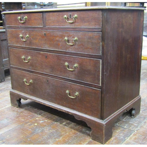 2709 - Georgian oak chest of three long and two short drawers with original brass work, 96cm wide