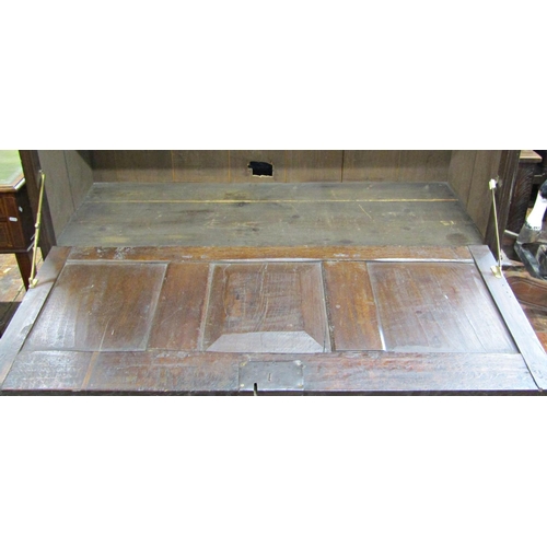 2713 - Old English oak cupboard, the lower section enclosed two panelled doors, the upper section with adap... 