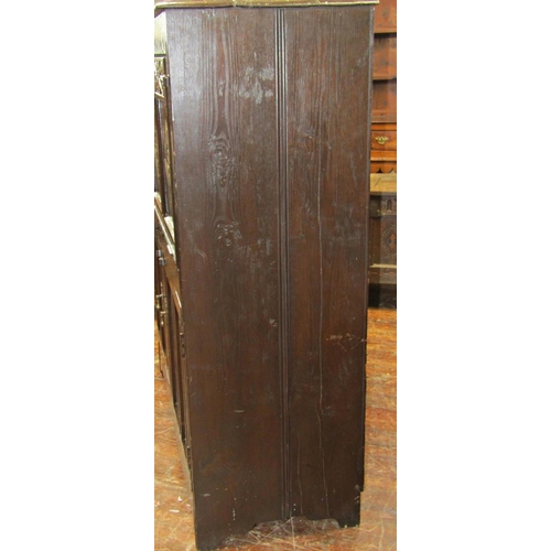 2713 - Old English oak cupboard, the lower section enclosed two panelled doors, the upper section with adap... 